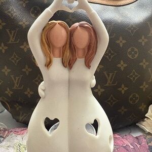 White Ceramic Figurine with Heart Cutouts sisters or best friends